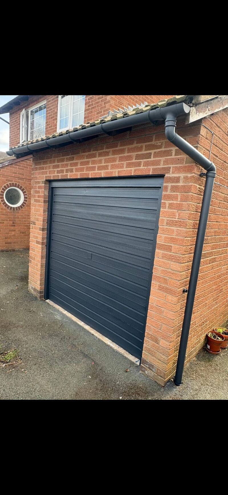 After: anthracite grey garage door